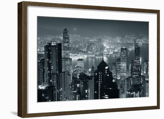 Hong Kong City Skyline At Night With Victoria Harbor And Skyscrapers Illuminated-Songquan Deng-Framed Art Print