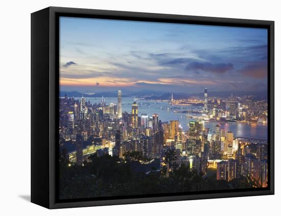 Hong Kong Island and Kowloon Skylines at Sunset, Hong Kong, China-Ian Trower-Framed Stretched Canvas