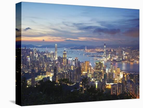 Hong Kong Island and Kowloon Skylines at Sunset, Hong Kong, China-Ian Trower-Stretched Canvas