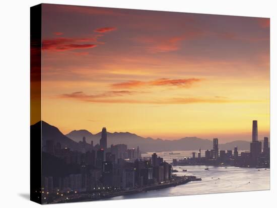 Hong Kong Island and Tsim Sha Tsui Skylines at Sunset, Hong Kong, China-Ian Trower-Stretched Canvas