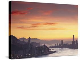 Hong Kong Island and Tsim Sha Tsui Skylines at Sunset, Hong Kong, China-Ian Trower-Stretched Canvas