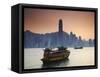 Hong Kong Island Skyline and Tourist Boat Victoria Harbour, Hong Kong, China-Ian Trower-Framed Stretched Canvas