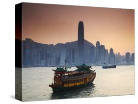 Hong Kong Island Skyline and Tourist Boat Victoria Harbour, Hong Kong, China-Ian Trower-Stretched Canvas