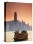 Hong Kong Island Skyline and Tourist Boat Victoria Harbour, Hong Kong, China-Ian Trower-Stretched Canvas