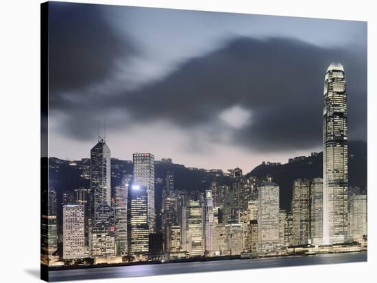 Hong Kong Skyline and financial district at dusk-Martin Puddy-Stretched Canvas