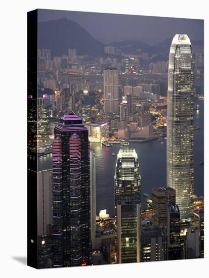 Hong Kong skyline and Victoria Harbor at night-Tibor Bogn?r-Stretched Canvas