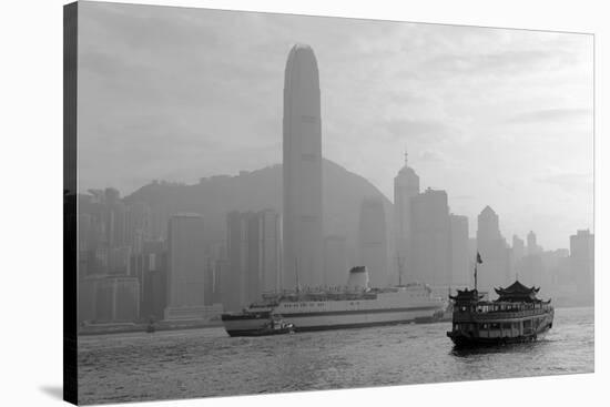 Hong Kong Skyline with Boats in Victoria Harbor in Black and White.-Songquan Deng-Stretched Canvas