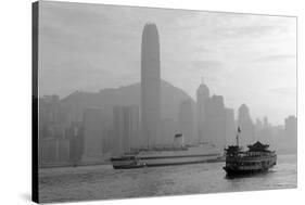 Hong Kong Skyline with Boats in Victoria Harbor in Black and White.-Songquan Deng-Stretched Canvas