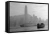 Hong Kong Skyline with Boats in Victoria Harbor in Black and White.-Songquan Deng-Framed Stretched Canvas