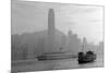 Hong Kong Skyline with Boats in Victoria Harbor in Black and White.-Songquan Deng-Mounted Photographic Print