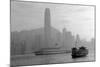 Hong Kong Skyline with Boats in Victoria Harbor in Black and White.-Songquan Deng-Mounted Photographic Print