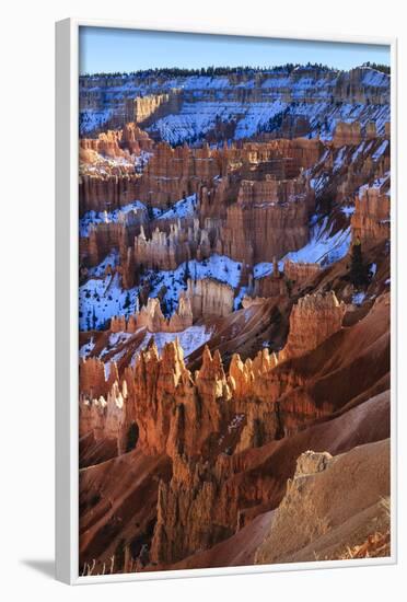 Hoodoos and Snowy Rim Cliffs Lit by Strong Late Afternoon Sun in Winter-Eleanor-Framed Photographic Print