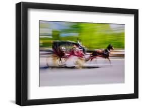 Horse and carriage drives in traffic down Central Park West in Manhattan, New York City, NY-null-Framed Photographic Print