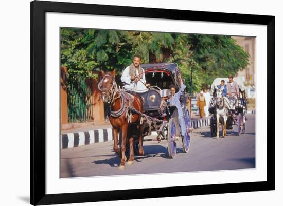 Horse and carriage on Riverside Drive in Luxor, Thebes West, Kena, Egypt-null-Framed Art Print