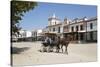 Horse and carriage riding along sand streets with brotherhood houses behind, El Rocio, Huelva Provi-Stuart Black-Stretched Canvas