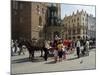 Horse and Carriages in Main Market Square, Old Town District, Krakow, Poland-R H Productions-Mounted Photographic Print