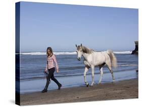 Horse and Lady Walking on Beach (Photo Released), California-Lynn M^ Stone-Stretched Canvas