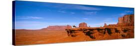 Horse and Rider, Monument Valley, Arizona, USA-null-Stretched Canvas