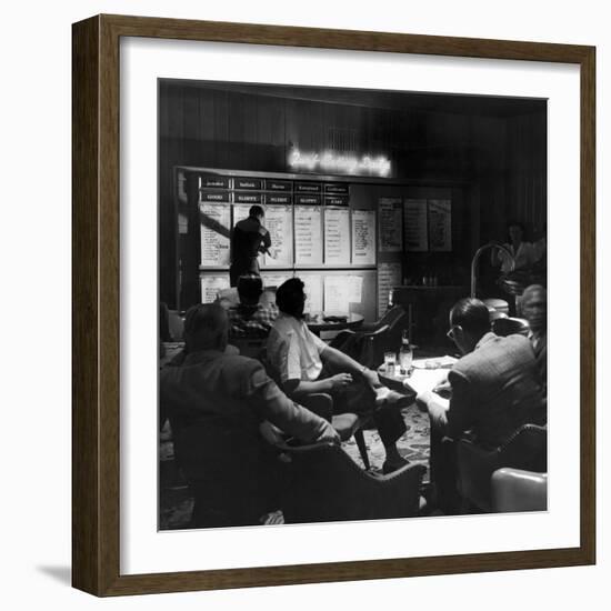 Horse Betting and Bookmakers Going on as a Gambling Option-J^ R^ Eyerman-Framed Photographic Print