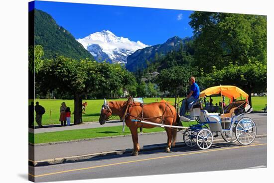 Horse-drawn Carriage on Hoeheweg Street with View of the Jungfrau Massif, Interlaken-null-Stretched Canvas