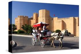 Horse drawn carriage ride in front of the Ribat in Monastir, Tunisia-null-Stretched Canvas