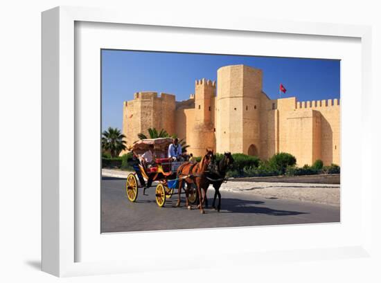 Horse drawn carriage ride in front of the Ribat in Monastir, Tunisia-null-Framed Art Print