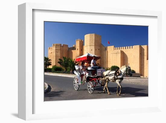 Horse drawn carriage ride in front of the Ribat in Monastir, Tunisia-null-Framed Art Print