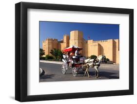 Horse drawn carriage ride in front of the Ribat in Monastir, Tunisia-null-Framed Art Print