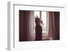 Horse Mask Man in Front of Window at Home-Eugenio Marongiu-Framed Photographic Print