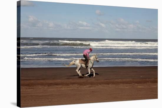 Horse rider on a beach near Azemmour, Morocco-Godong-Stretched Canvas