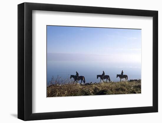 Horseback riding on the tideland, Sylt, Schleswig-Holstein, Germany-null-Framed Art Print