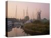 Horsey Wind Pump and Boats Moored on the Norfolk Broads at Dawn, Norfolk, England, United Kingdom-Miller John-Stretched Canvas
