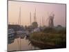 Horsey Wind Pump and Boats Moored on the Norfolk Broads at Dawn, Norfolk, England, United Kingdom-Miller John-Mounted Photographic Print