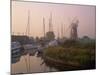 Horsey Wind Pump and Boats Moored on the Norfolk Broads at Dawn, Norfolk, England, United Kingdom-Miller John-Mounted Photographic Print