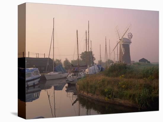 Horsey Wind Pump and Boats Moored on the Norfolk Broads at Dawn, Norfolk, England, United Kingdom-Miller John-Stretched Canvas