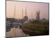 Horsey Wind Pump and Boats Moored on the Norfolk Broads at Dawn, Norfolk, England, United Kingdom-Miller John-Mounted Photographic Print