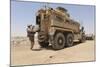 Hospital Corpsman Loads Up a Mine Resistant Ambush Protected Vehicle-null-Mounted Photographic Print