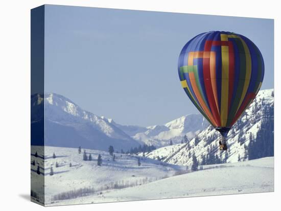Hot Air Ballon and the North Cascade mountains, Methow Valley, Washington, USA-William Sutton-Stretched Canvas