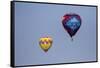 Hot air balloon bringing color to the sky.-Larry Ditto-Framed Stretched Canvas