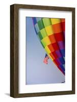 Hot air balloon bringing color to the sky.-Larry Ditto-Framed Photographic Print