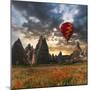 Hot Air Balloon Flying over Red Poppies Field Cappadocia Region, Turkey-Tetyana Kochneva-Mounted Photographic Print