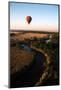 Hot Air Balloon Hovers over the Winding Mara River in the Masai Mara Reserve (Kenya)-Paul Banton-Mounted Photographic Print