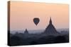 Hot Air Balloon over Temples on a Misty Morning at Dawn, Bagan (Pagan), Myanmar (Burma)-Stephen Studd-Stretched Canvas