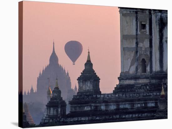Hot Air Balloon over the Temple Complex of Pagan at Dawn, Burma-Brian McGilloway-Stretched Canvas