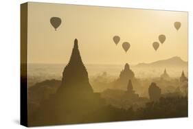 Hot air balloons above the temples of Bagan (Pagan), Myanmar (Burma), Asia-Janette Hill-Stretched Canvas