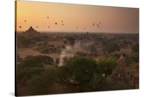 Hot Air Balloons at Sunrise Above Bagan (Pagan), Myanmar (Burma), Asia-Colin Brynn-Stretched Canvas