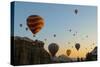 Hot Air Balloons Cruising over Cappadocia, Anatolia, Turkey, Asia Minor, Eurasia-James Strachan-Stretched Canvas