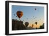 Hot Air Balloons Cruising over Cappadocia, Anatolia, Turkey, Asia Minor, Eurasia-James Strachan-Framed Photographic Print