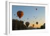 Hot Air Balloons Cruising over Cappadocia, Anatolia, Turkey, Asia Minor, Eurasia-James Strachan-Framed Photographic Print