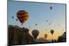 Hot Air Balloons Cruising over Cappadocia, Anatolia, Turkey, Asia Minor, Eurasia-James Strachan-Mounted Photographic Print